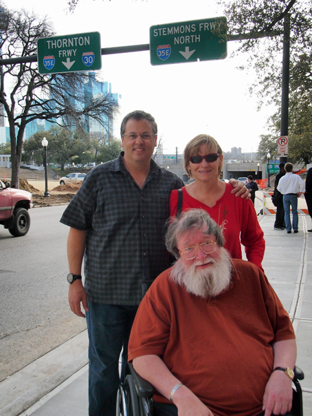 Clint, Cheryl, and Bruce in front of the Book Depository
